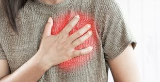 woman-suffering-from-sudden-heart-attack